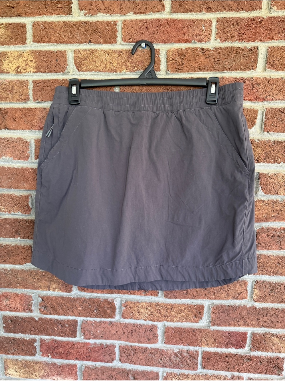 Alaskan Hardware Skort.   Size 14.  Dark Gray. Pockets.